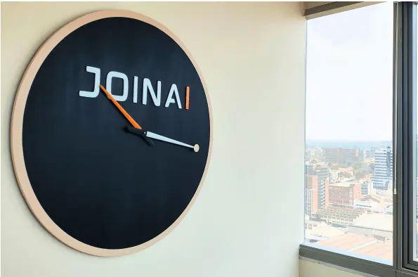 Joinai clock overlooking central Harare