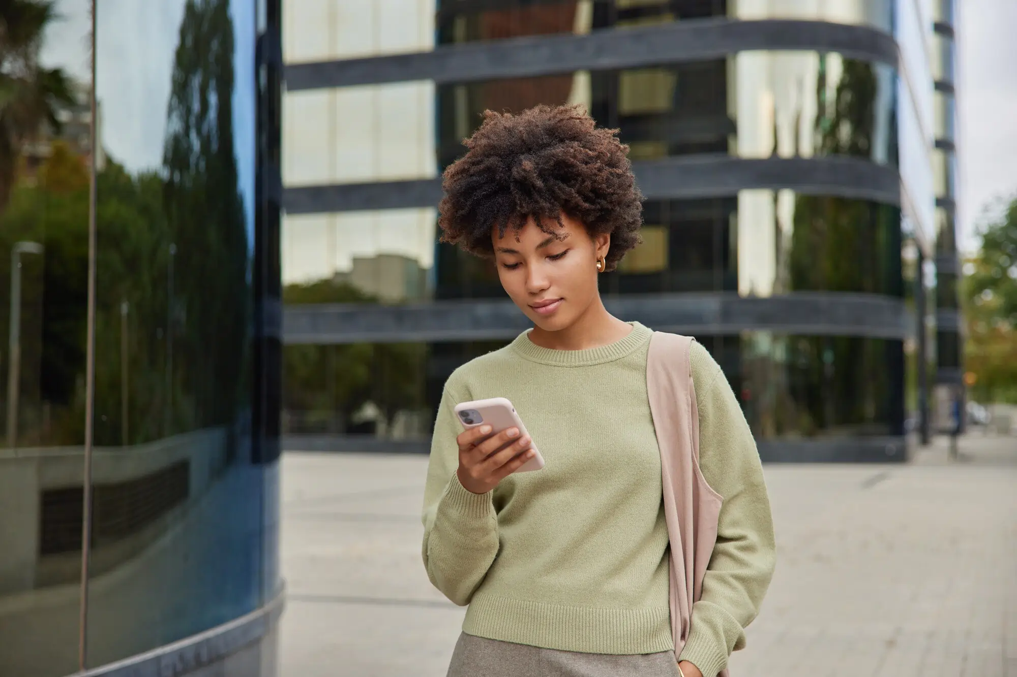 A Joinai customer using her phone securely